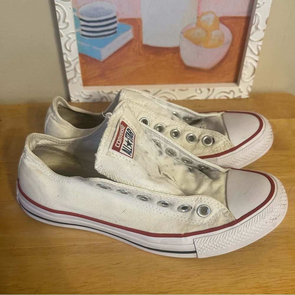 Converse White Slip-On Sneakers with Red Accents. Women’s 7. Men’s 5.